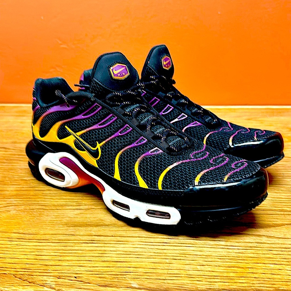 Nike. Black, yellow, purple.  Size 12. Very little wear.